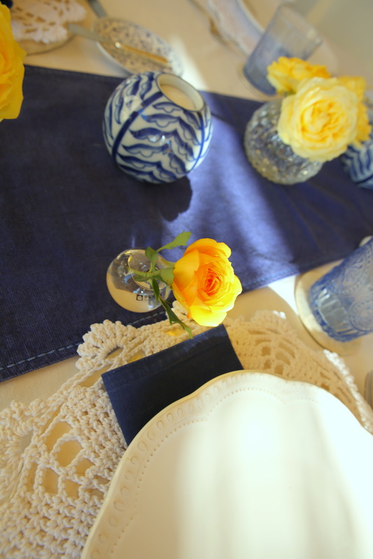 Blue, white and yellow tablescape by The Belle Blog
