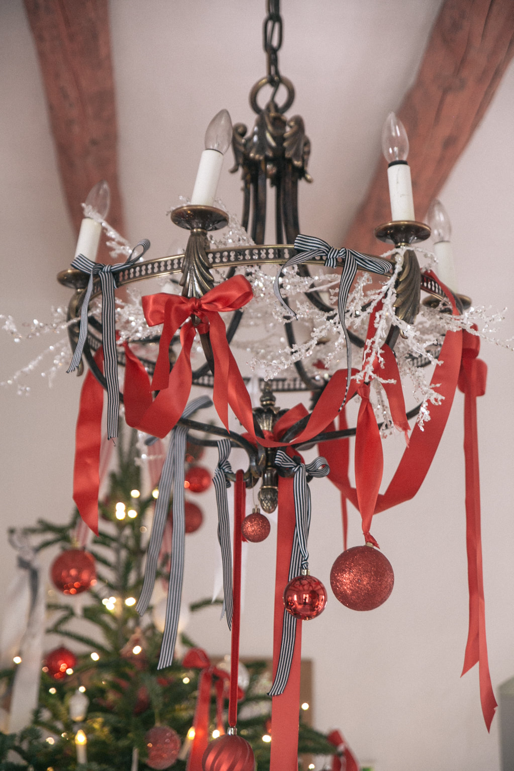 Red and White Christmas hallway decorations - The Belle Blog