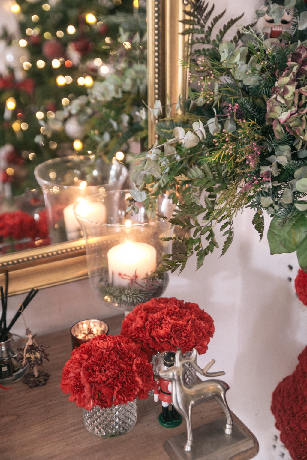 Red and White Christmas hallway decorations by The Belle Blog 